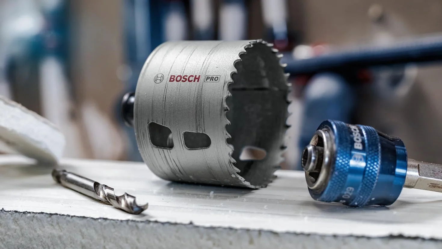 Bosch 9 x PRO Multi Material Power Change Plus zestaw otwornic – przezroczyste etui (do miękkiego drewna, płyt kartonowo-gipsowych, Ø 20-64 mm, profesjonalne akcesoria do wiertarki/wkrętarki)